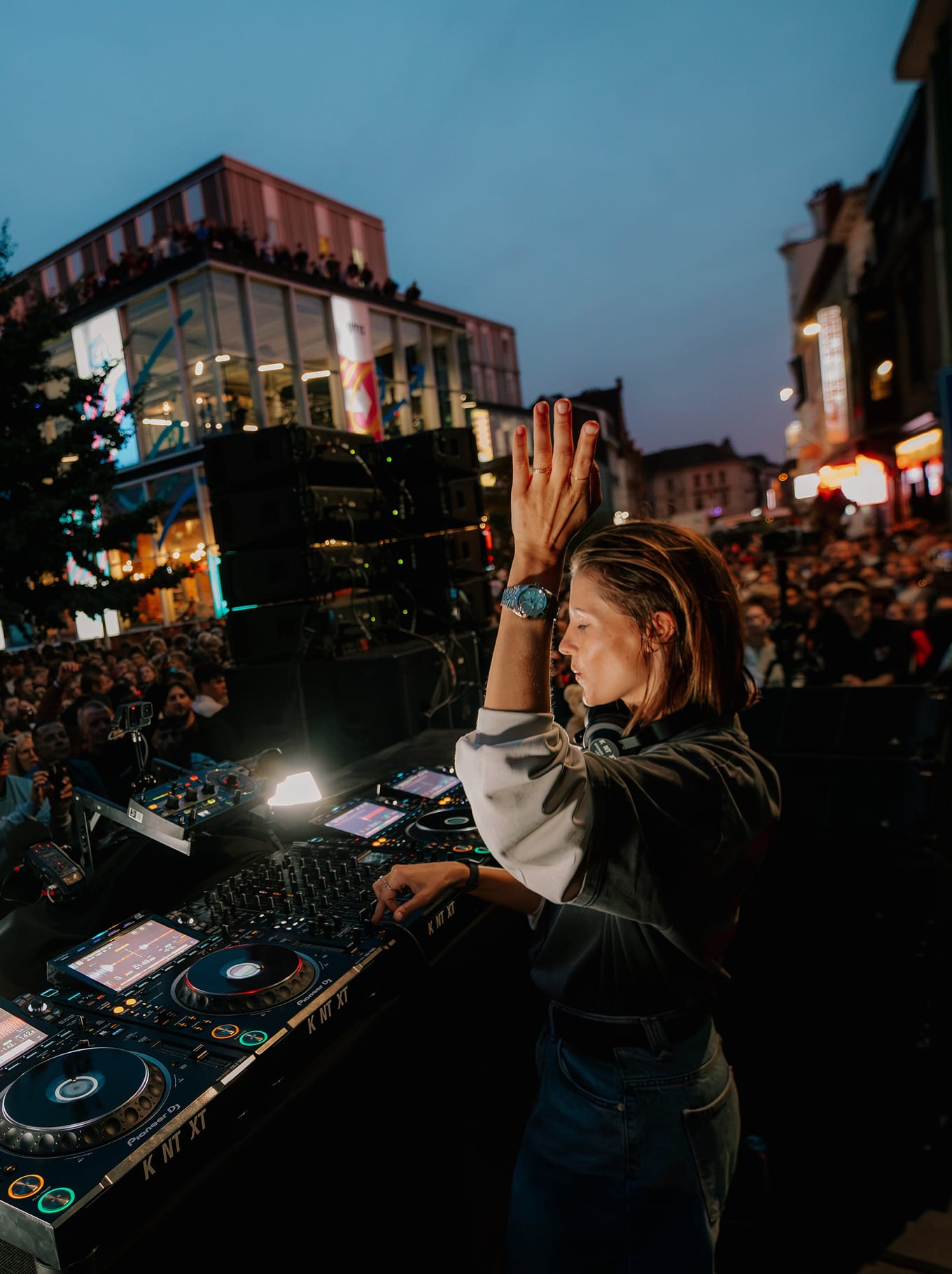 Charlotte de Witte mixing in the street at night