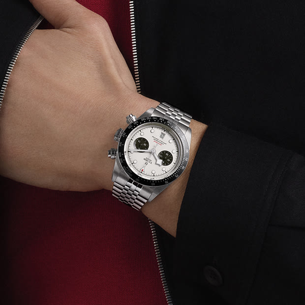 Black Bay Chrono worn with white dial and 5-link stainless steel bracelet