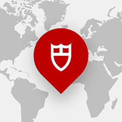 A Tudor icon on a world map