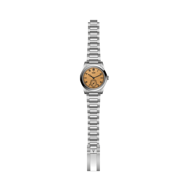 Tudor Monarch three-quarter view showing faceted watch case and steel bracelet